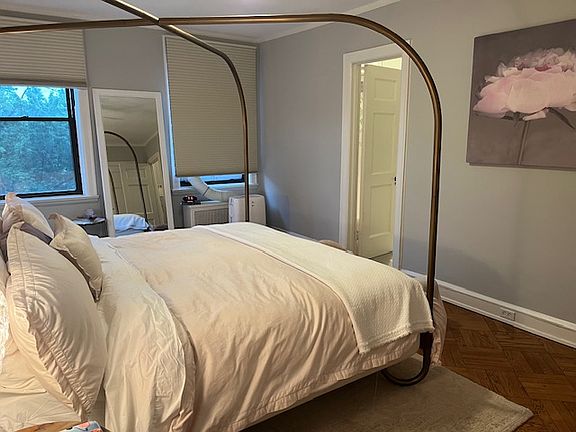 Door connecting to bathroom.