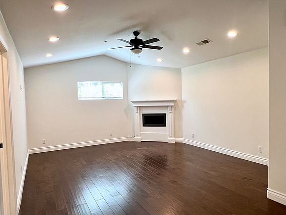 Upper living room with gas fireplace