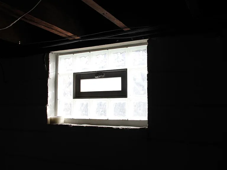 Glass block in basement for safety.
