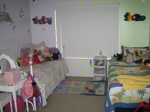 2 large secondary bedrooms, one on main floor