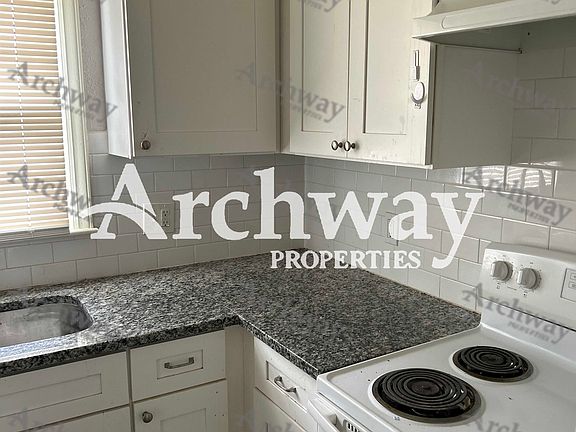 Kitchen features granite countertops!