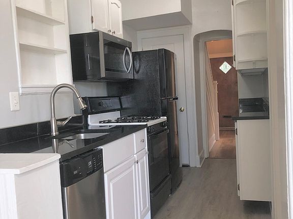 Kitchen open to Front and Rear and just off of Dining Room