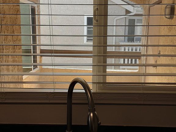 View from kitchen onto private patio