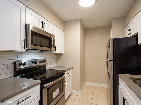 Newly renovated kitchen with brand new white shaker cabinetry