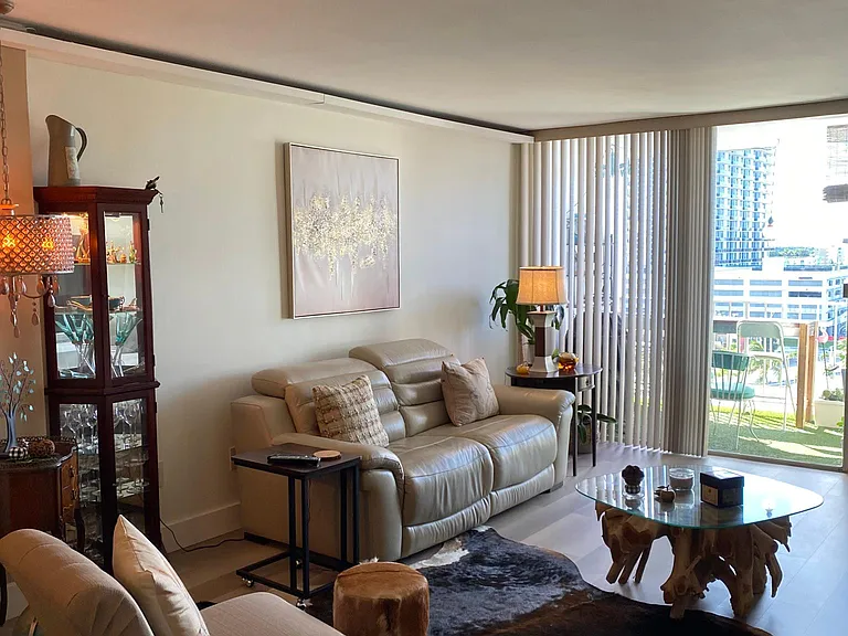 Living room with dark coastal curtains