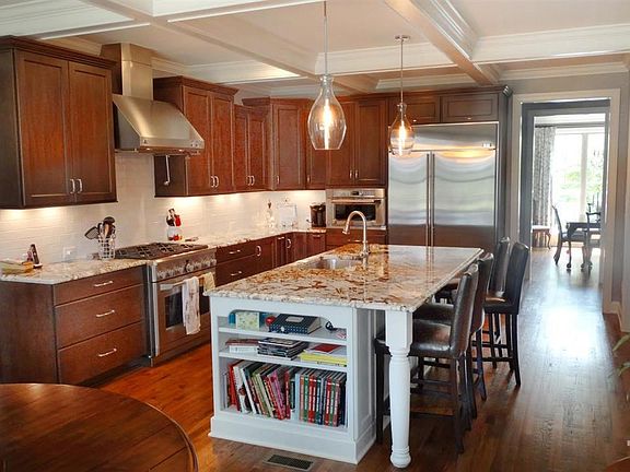 Welcome to this AMAZING Kitchen! Over $20,000 of upgrades in the kitchen alone include GE Monogram Appliances, and Advantium Microwave that doubles as a 2nd Oven and also a Warming Oven.