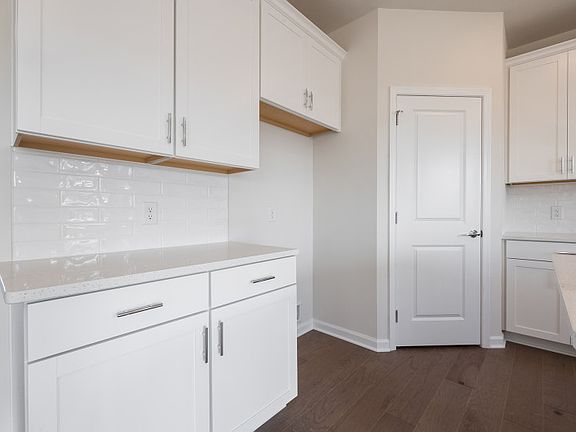 Plenty of storage space in kitchen with pantry