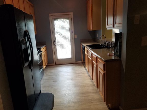 Kitchen and Exit to Back Yard and Patio