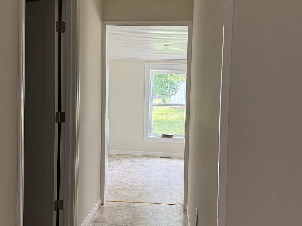Hall from kitchen to mud room/laundry room.