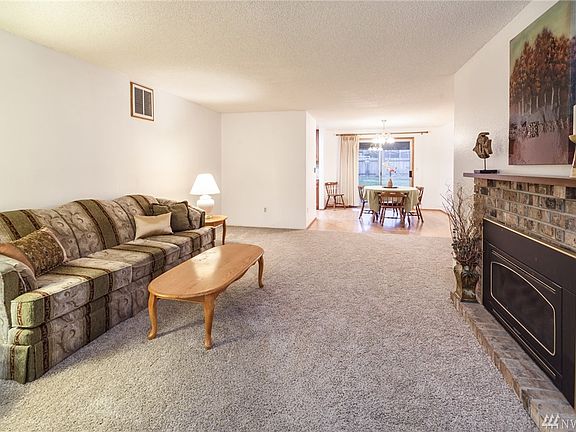 Living room leads to formal dining room