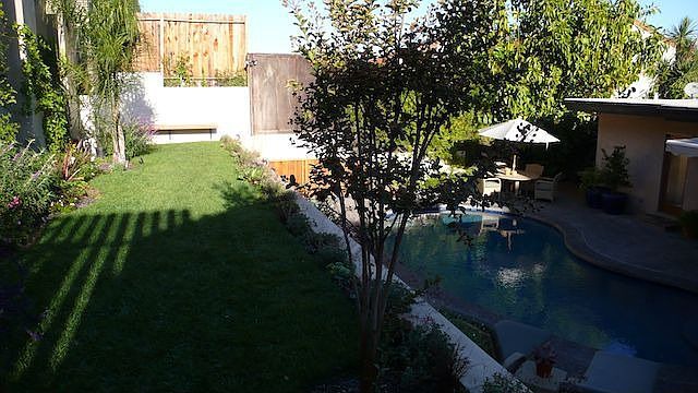 Backyard: spacious, relaxing terrace with views, deck, pool, delightful.