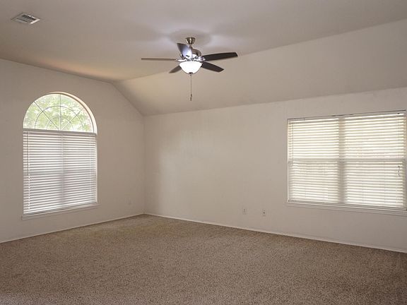 walk into large open living room and dinning room
