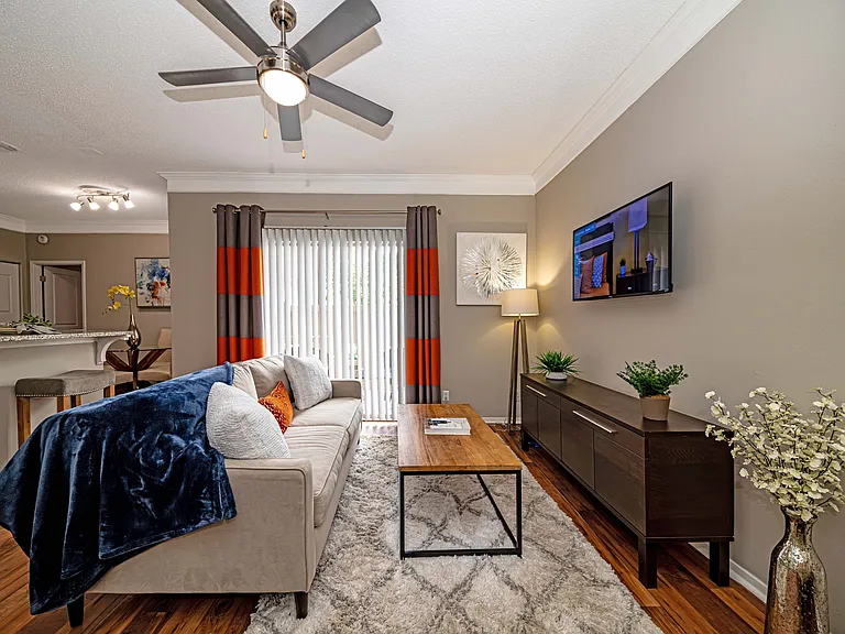 Spacious living room with hardwood-style flooring
