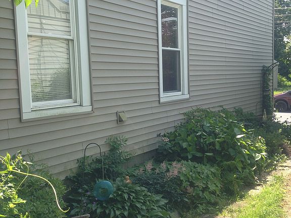 Side of house by driveway