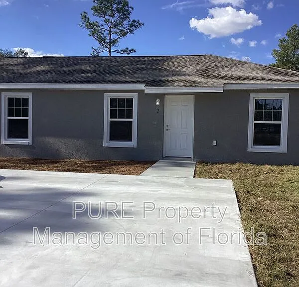 6577 SW 140th Place Rd #2 — Photo 1