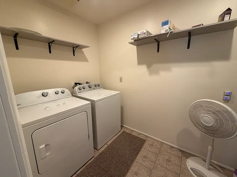 Laundry room with washer/dryer.