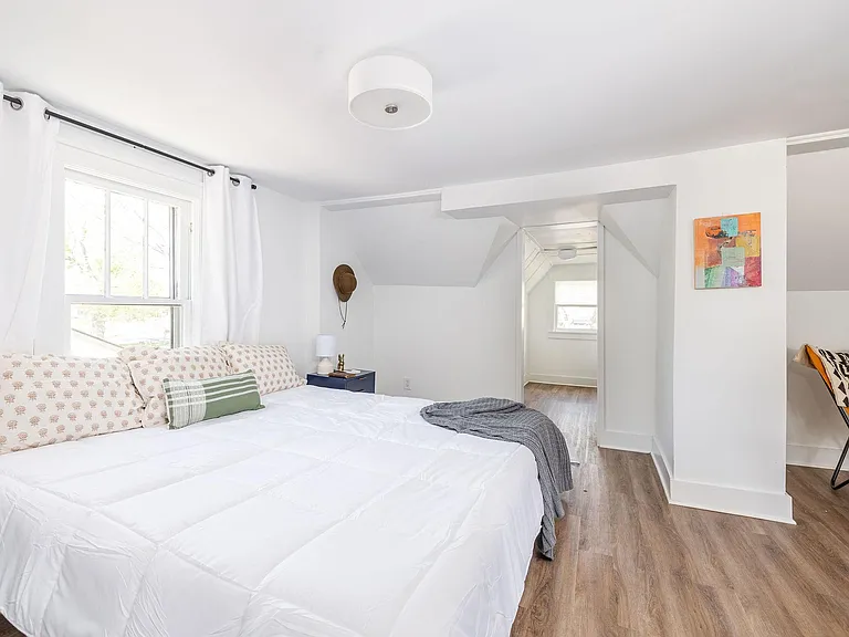 This bed is a King--plenty of room up here with 2 generous closets