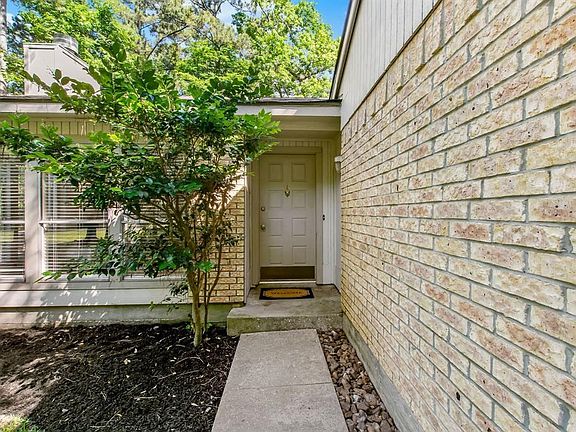 Welcoming walkway leads you to your new home!  Note home has recent roof!
