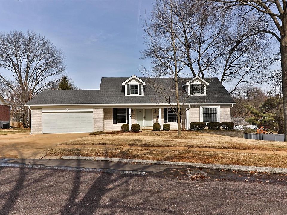 Front of house located on a quiet street.