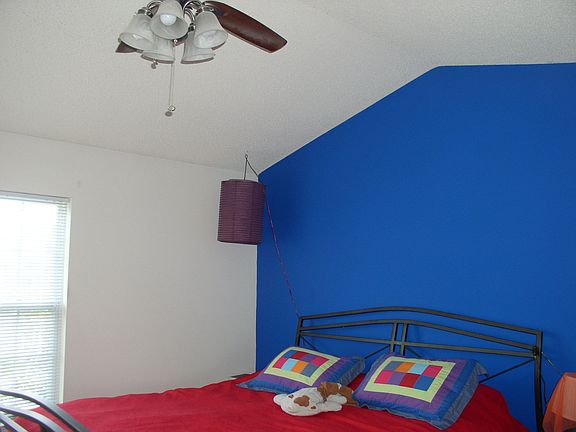 One of two master suites w/vaulted ceiling.