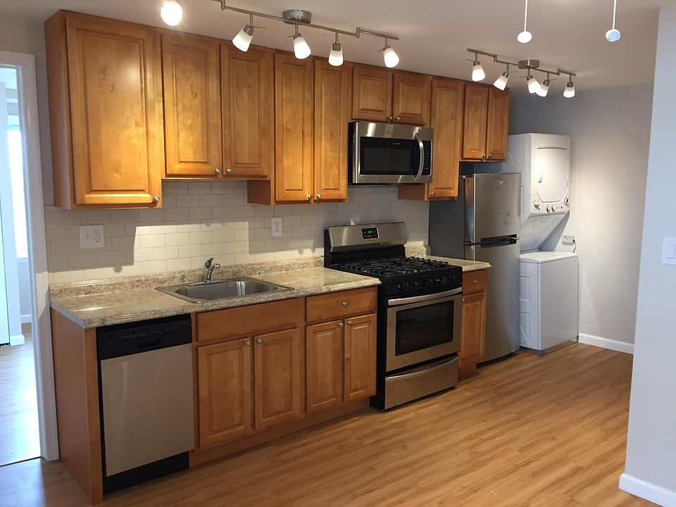 Standing in the living area, looking into kitchen