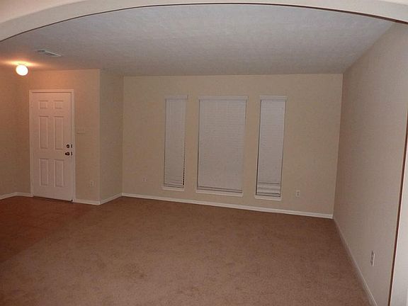 Entry opens into formal living room