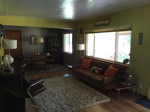 Living room walls are now grey (not green)