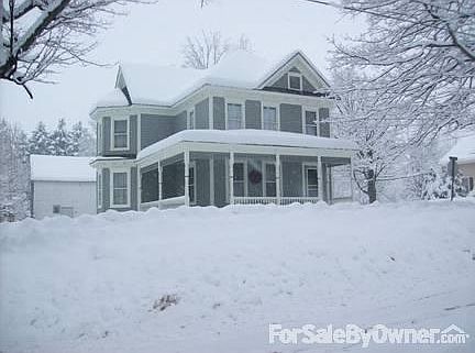 Front of house from Maple Avenue
						:
						Wrap around porch in winter.
