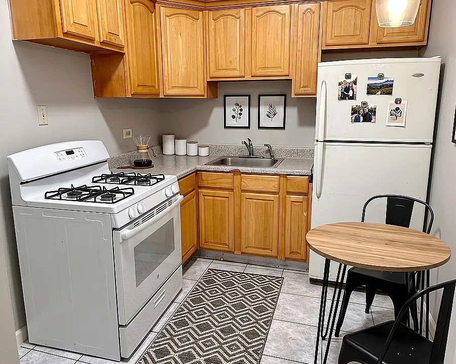 Kitchen- This room has been virtually staged using AI to help visualize its layout and design potential.