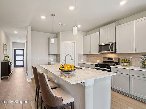 The Winedale floorplan in Heights of Barbers Hill of Mont Belvieu, TX.