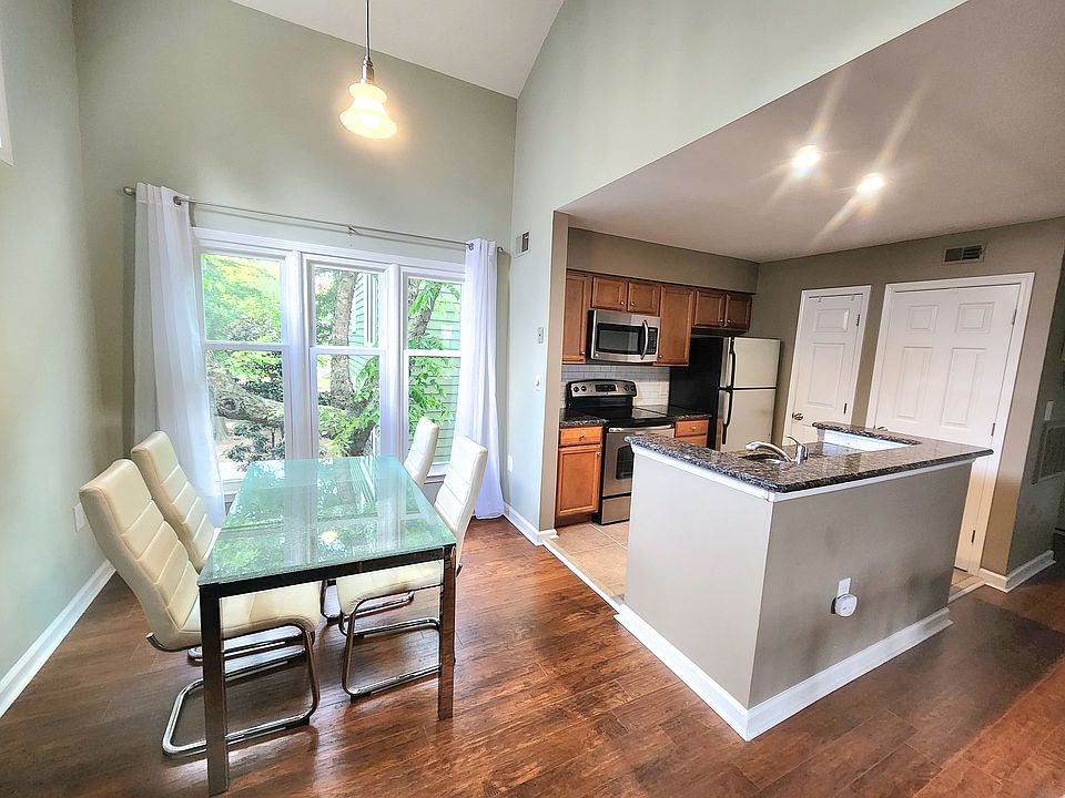 Kitchen and dining room. Bar cart is against the wall, not pictured.