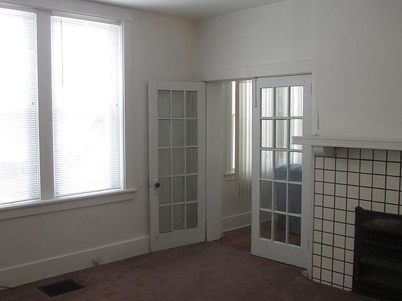 living room with decorative fireplace