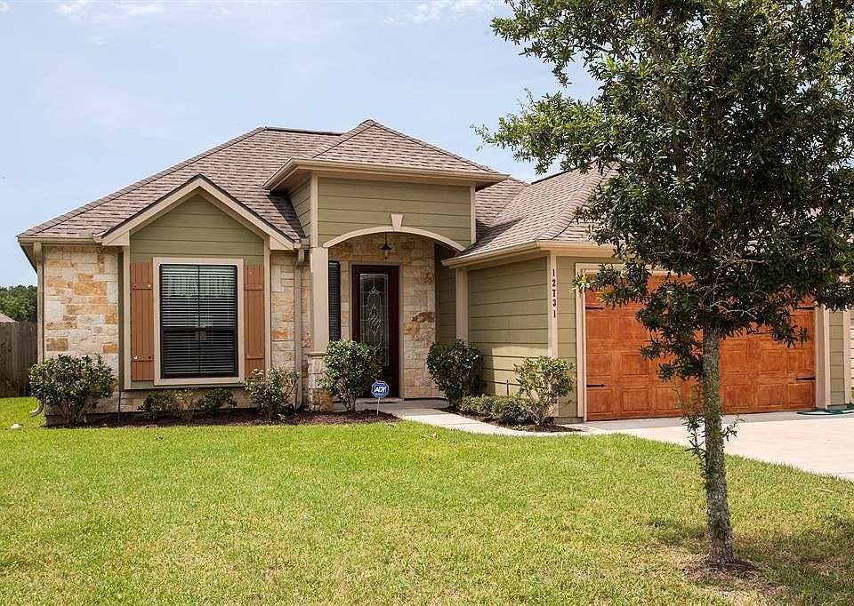 Natural stone and cement board siding offer a low maintenance exterior...