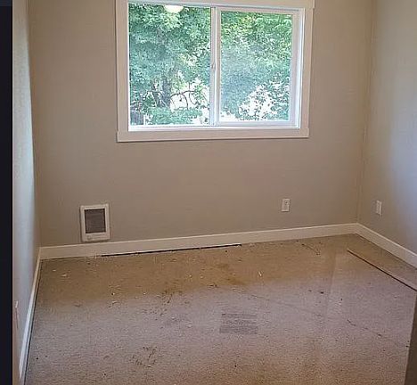 One of the bedrooms - Vinyl flooring is being installed this week.