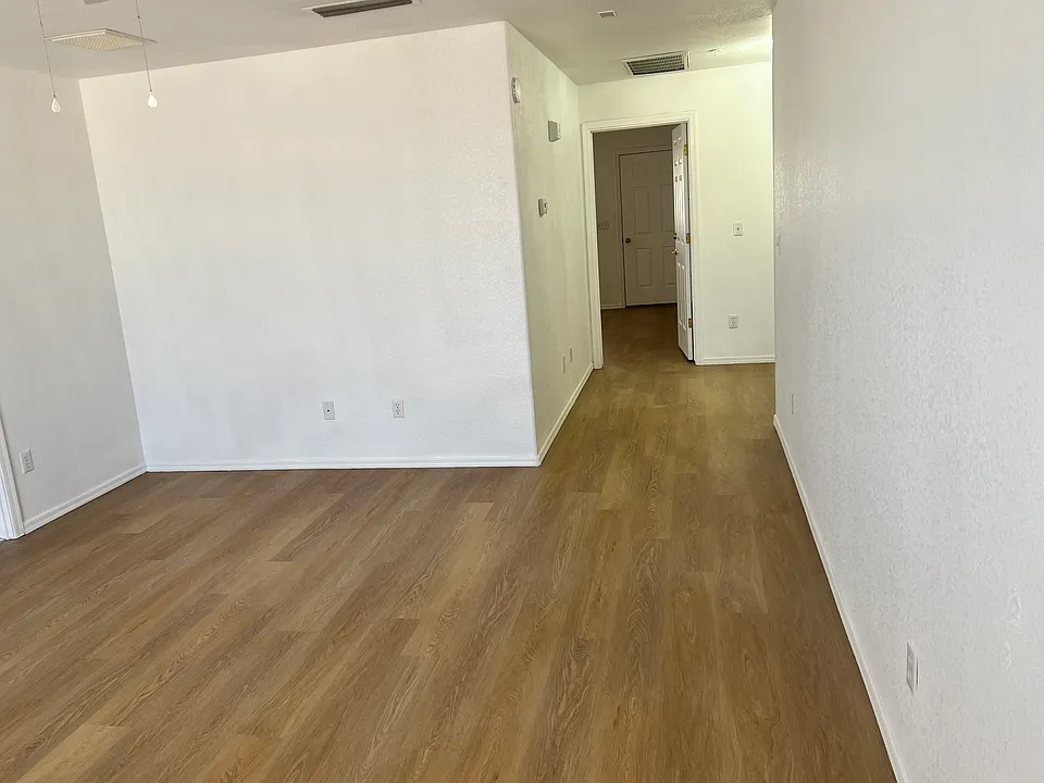 View of living room towards bedroom