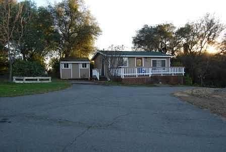 Shed on the left of the cottage is included.