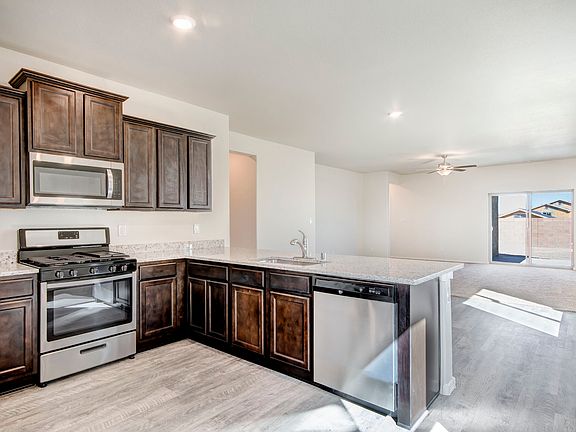 Chef-ready kitchen overlooking the dining area and family room.
