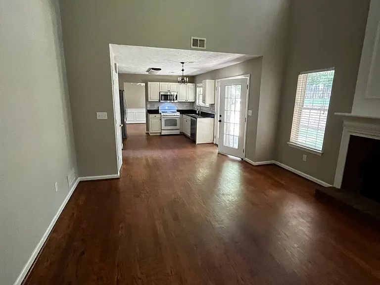 Family room - Looking to kitchen. French doors open to patio and backyard.