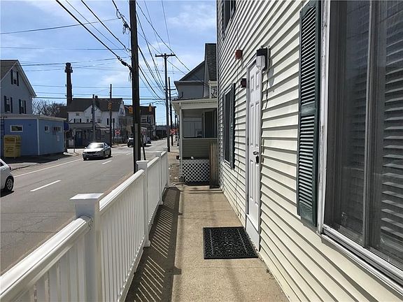 Front entrance of building. Metacom Ave. faces east.