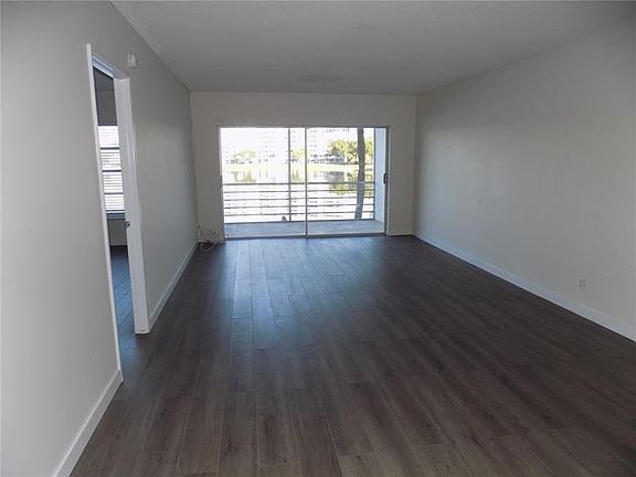 5th image of 2751 N Palm Aire Dr APT 206