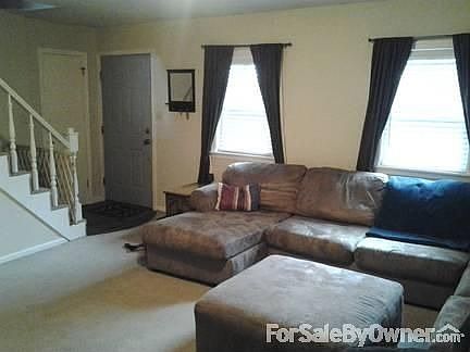 Dining room
						:
						Built in shelving and hardwood floors