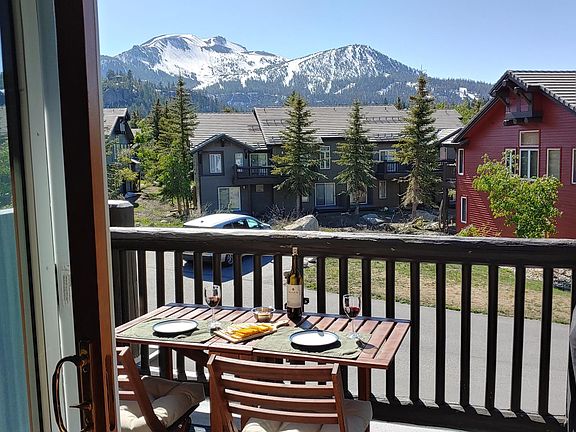 Upstairs balcony with BBQ and views of Mammoth Mountain Ski Area.