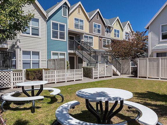 BBQ area with picnic tables.