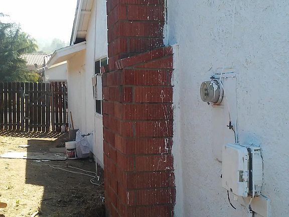 side of house on right side if your facing the house