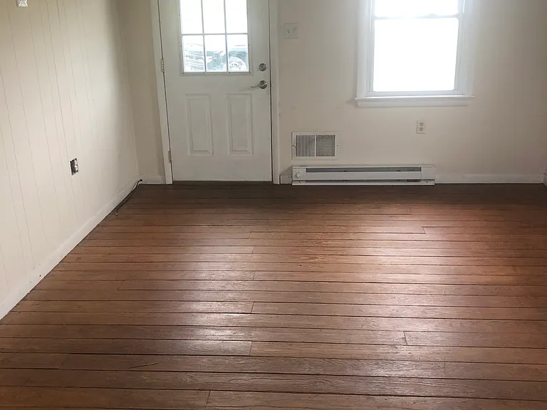 Kitchen/living area looking out to front doorway.