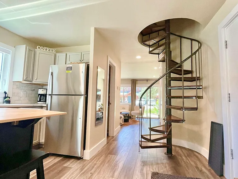 spiral staircase, 2 bedrooms upstairs