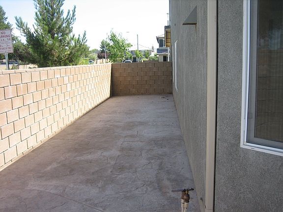 Total back and side with stamped concrete