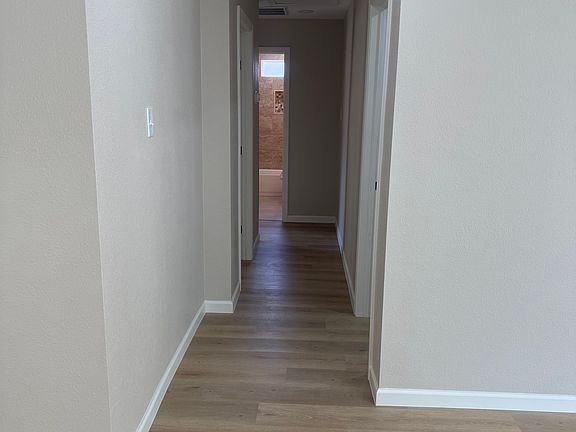 View from kitchen, breakfast and living room to bedrooms