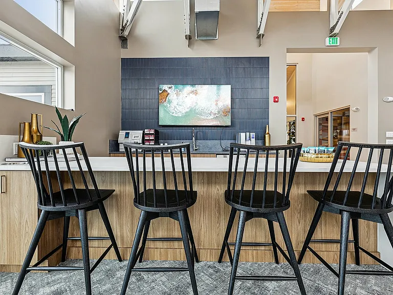 Explore this chic kitchen space, offering a blend of modern design and functionality.