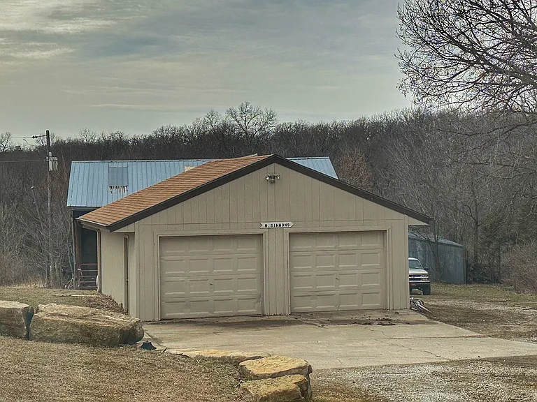 In addition to the attached garage, the property features a separate two-car detached garage_a standout feature for anyone needing extra space.

Ideal for additional vehicle storage, recreational equipment, tools, or even a dedicated workshop area.